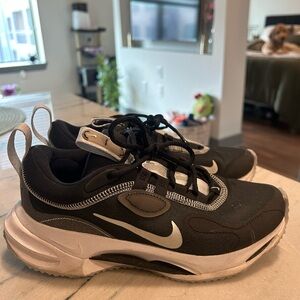 Black Nike running shoes